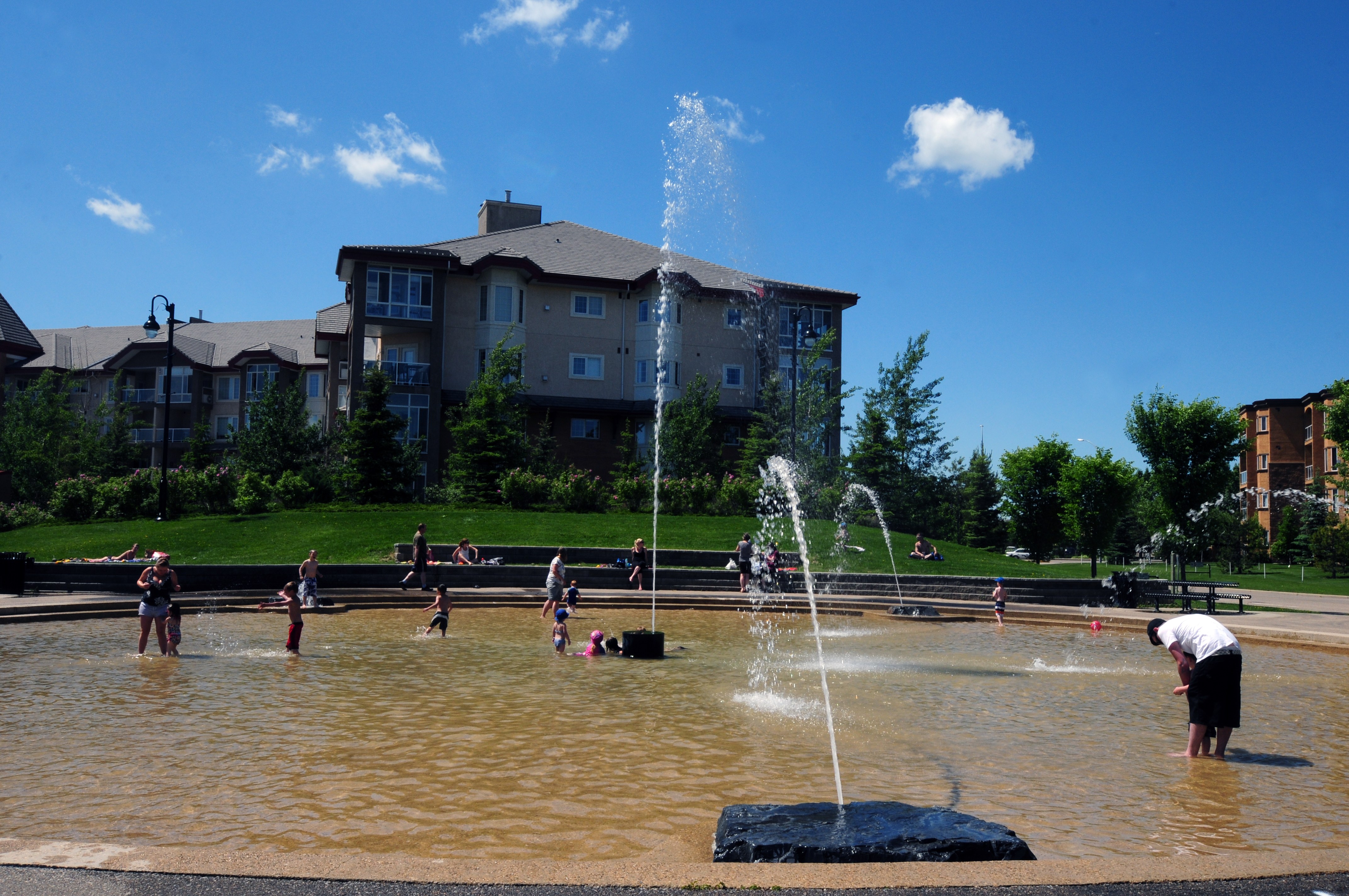 WATER FUN- The water park along 52 Ave. was busy with little toddlers running around splashing in the cool water as the heat kept coming Wednesday afternoon.