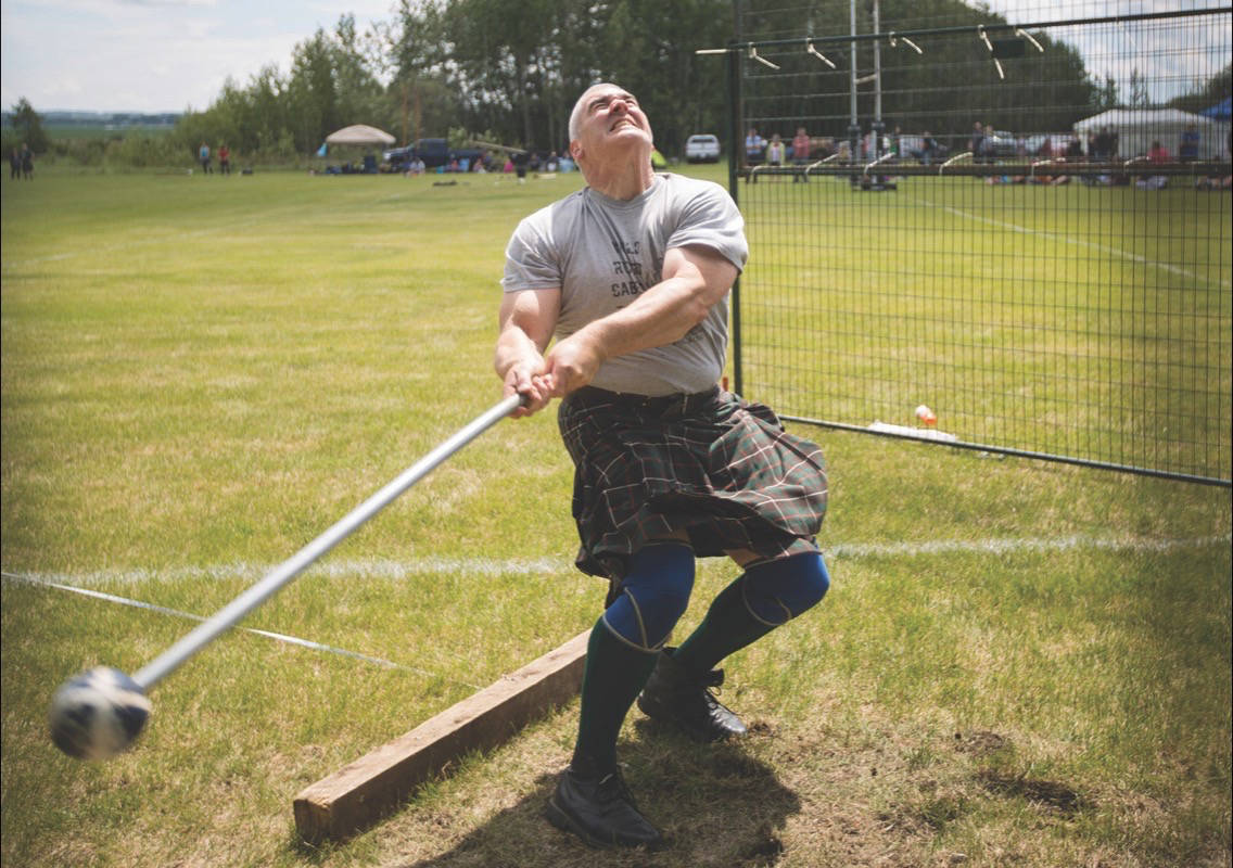 STRONG MAN- Joel Thiessen competed in the Hammer Throw competition during the 69th Annual Red Deer Highland Games last year. The annual festival of Scottish heritage featured competitions in piping and drumming, dancing and heavy events.                                Express file photo