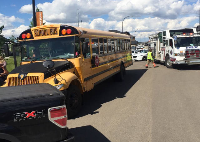 CHARGES LAID - Shelly Joy Kolodychuk, 42, of Red Deer has been charged with impaired driving-related offences after a school bus carrying 18 children collided with a tree and street sign in Vanier Woods on Monday.                                Todd Colin Vaughan/Red Deer Express