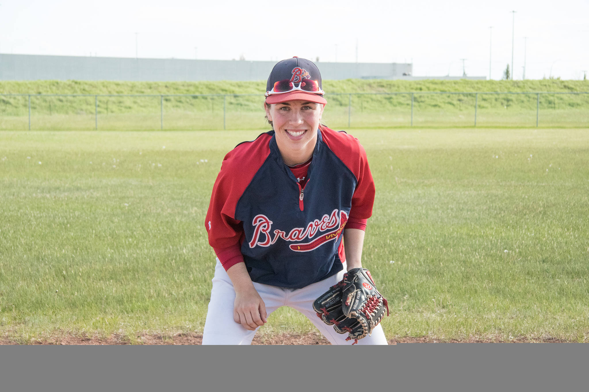MAKING HER MARK - Braves short-stop Kelsey Lalor, 19, is currently the only female ‘AAA’ baseball player in the province of Alberta.                                Todd Colin Vaughan/Red Deer Express