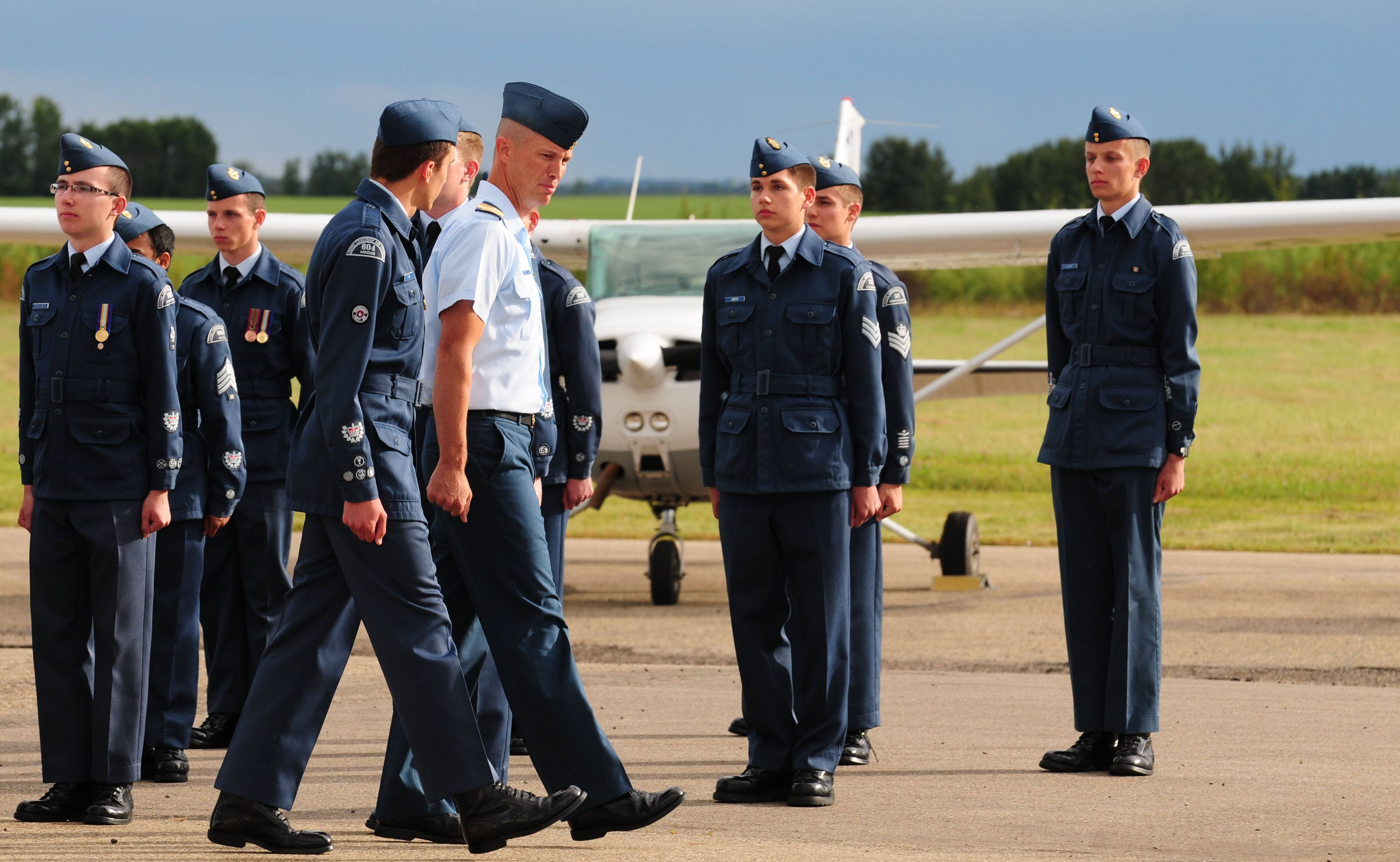 INSPECTION- Cadets were looked over just before they received their wings Thursday evening at Sky Wings Aviation in Springbrook. The Cadets underwent seven weeks of training and all achieved honours.