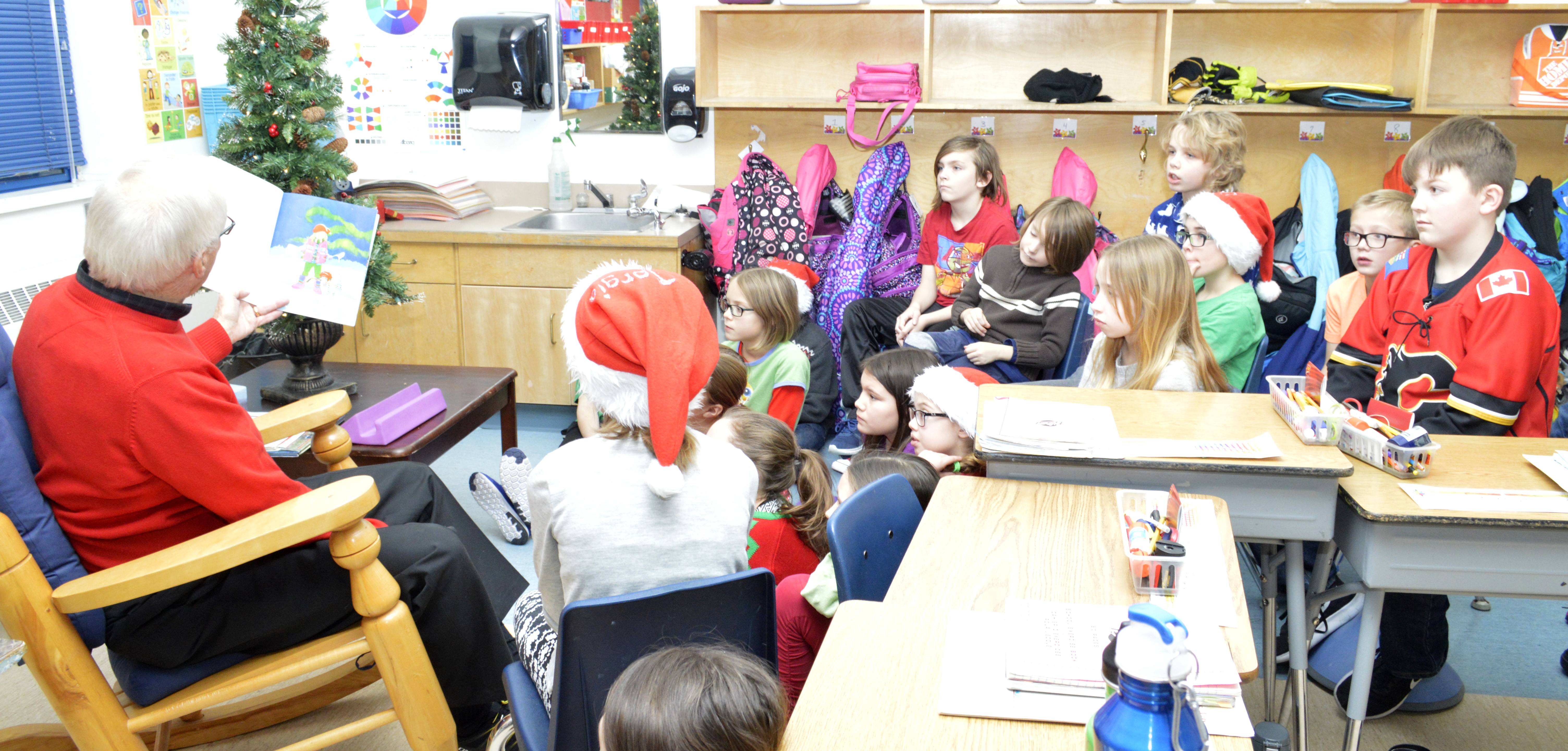 STORYTIME - Martin Theriault’s Grade 4-5 class listening intently to retired principal Barrie Wilson’s story last Friday at Mountview Elementary.