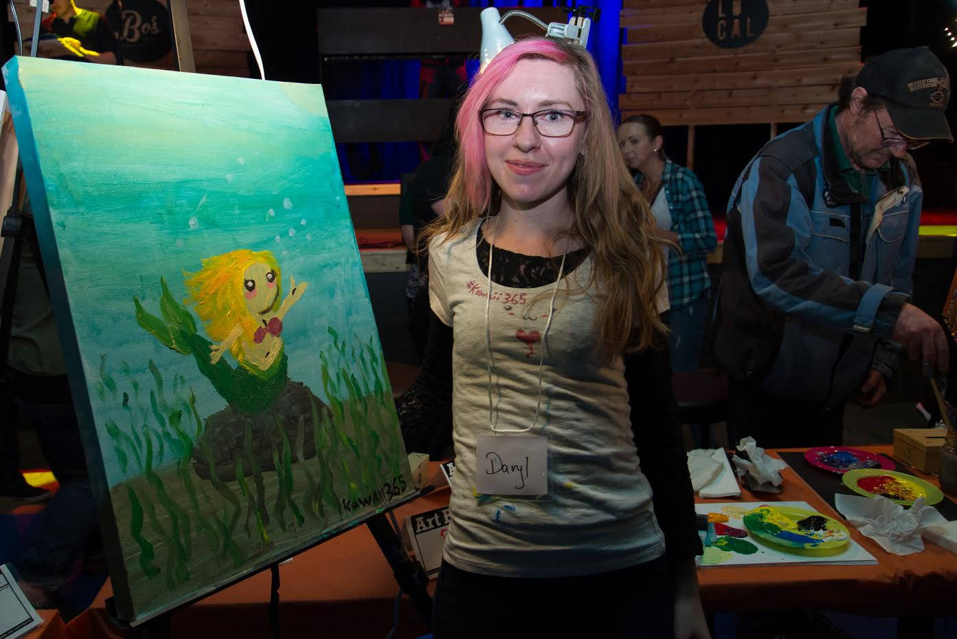 CREATIVITY - Daryl Januszewski, seen here at Red Deer’s Art Battle, recently completed her project Kawaii365. Januszewski created 365 art projects and left them throughout the City to promote the arts scene and brighten peoples’ days.                                photo submitted