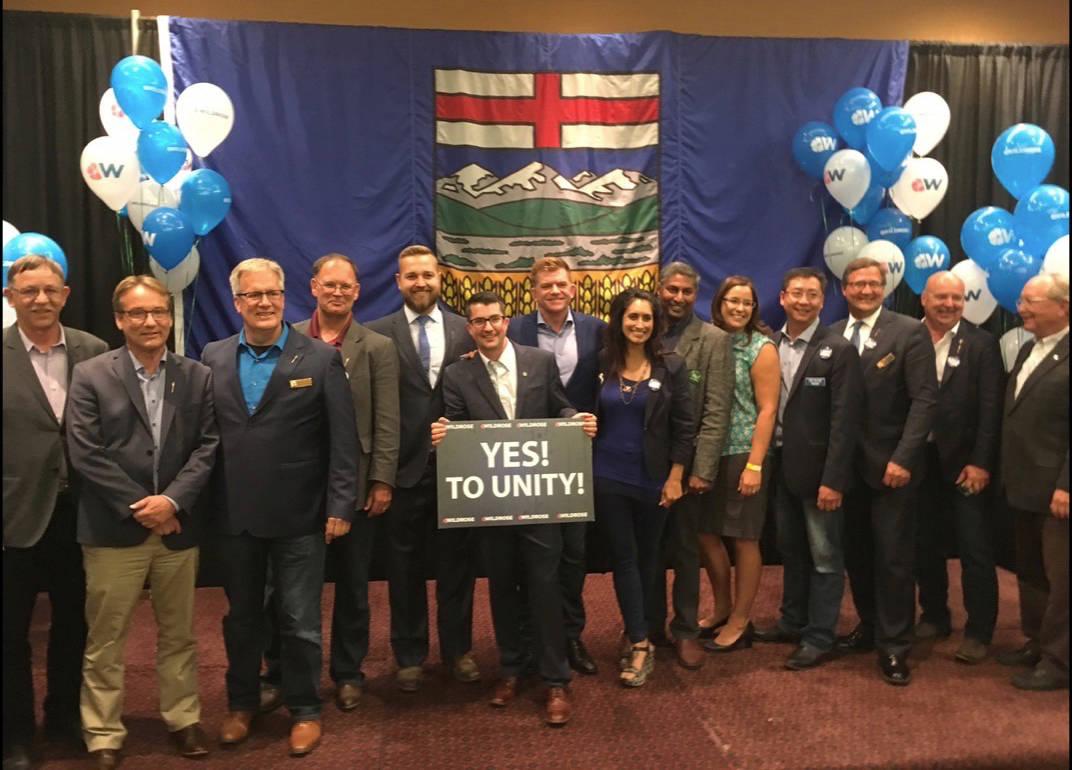 FORWARD FOCUS - Brian Jean, Wildrose leader, is flanked by supporters following the vote announcement on Saturday in Red Deer that 95% of his party’s members opted to back uniting the right in Alberta.                                Mark Weber/Red Deer Express