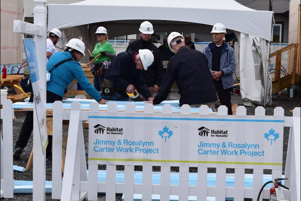 NEW HOMES - Former United States President Jimmy Carter was near Edmonton helping building homes for Habitat for Humanity earlier this summer. photo submitted