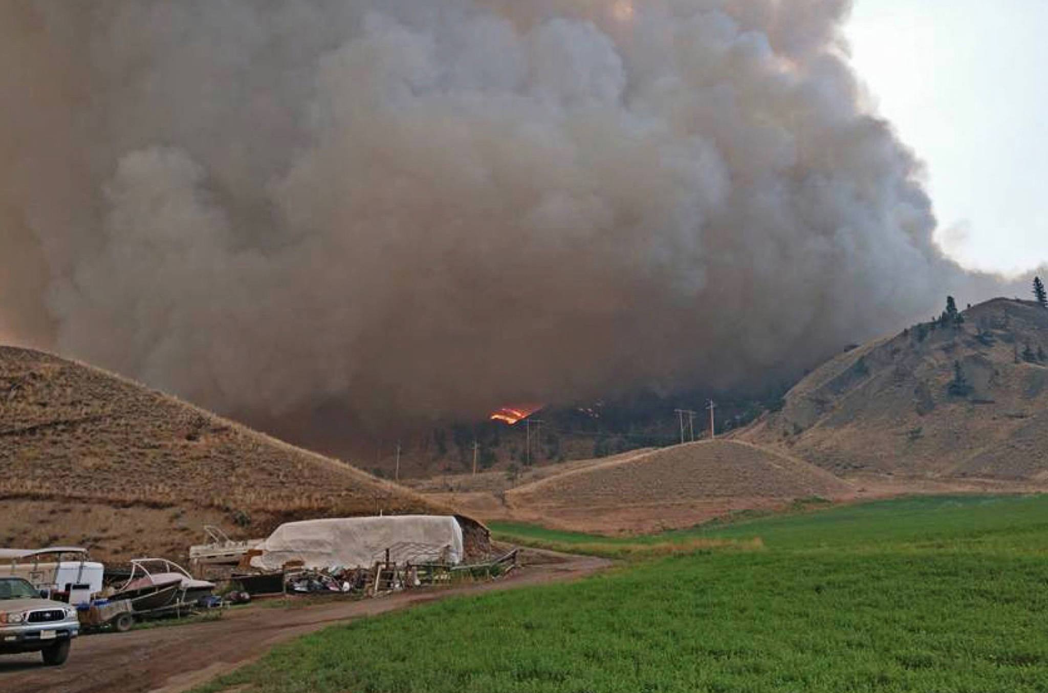 Smoke and flames from what residents are saying was a controlled burn near Loon Lake Tuesday (Facebook @20MileRanch)