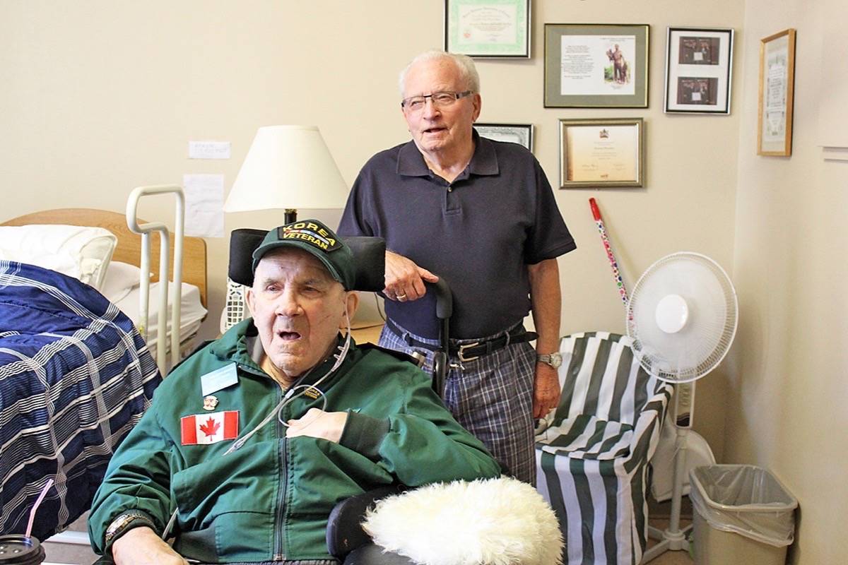 GOOD FRIENDS - Former Korean War Veterans Horace Warden and Don Holloway have remained friends since their time in the war. Carlie Connolly/Red Deer Express