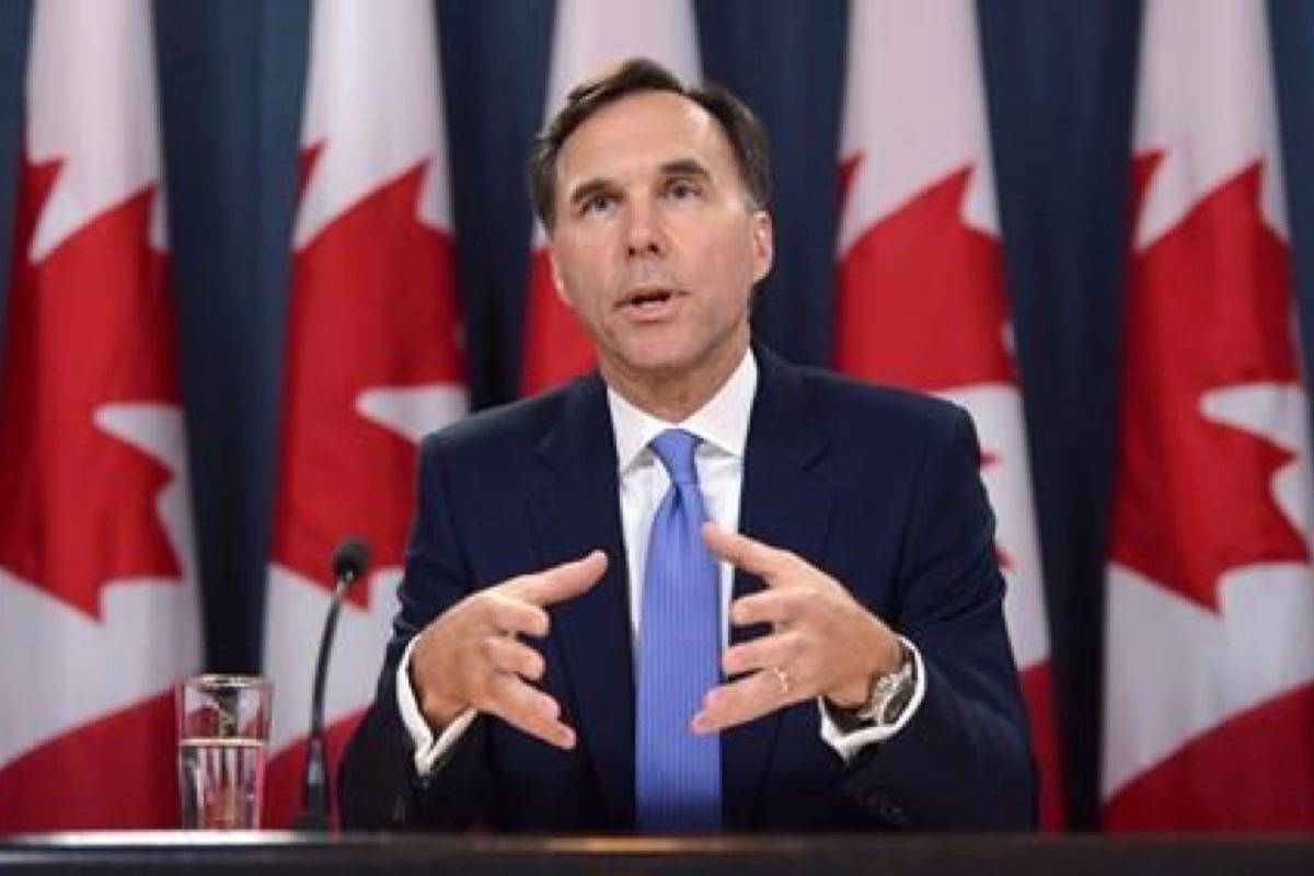 Finance Minister Bill Morneau holds a news conference at the National Press Theatre in Ottawa on Tuesday, July 18, 2017. THE CANADIAN PRESS/Sean Kilpatrick