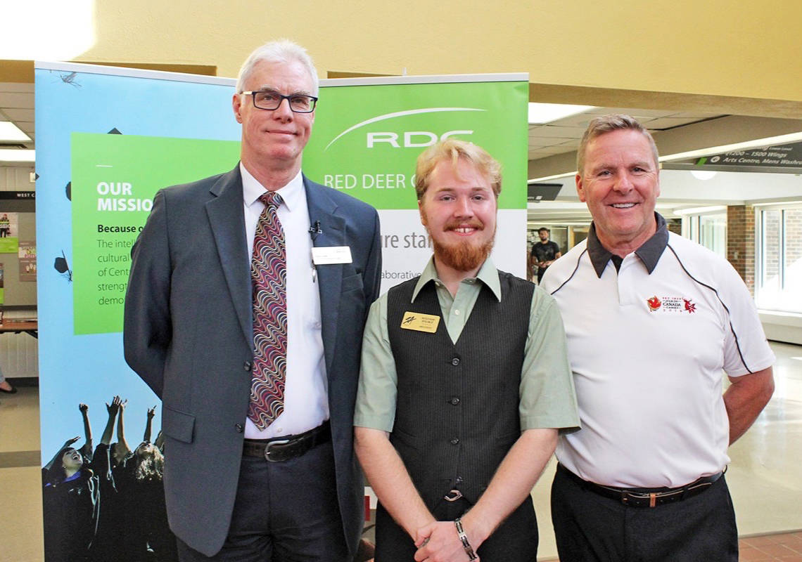 BACK TO SCHOOL - From left, Steven Lane, William Baliko and Joel Ward of Red Deer College welcome new and returning students to RDC for an exciting year of new programs and opportunities. Carlie Connolly/Red Deer Express