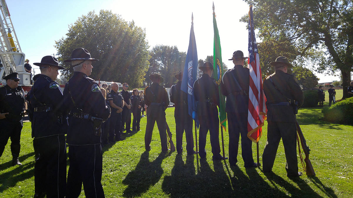 The U.S. colour guard and other first responders at Peace Arch Park Monday, where a memorial was held to honour those who died in the Sept. 11, 2001 terrorist attacks. (Tracy Holmes photo)