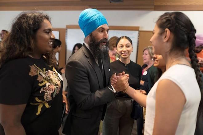 Leadership contender Jagmeet Singh greets supporters before the NDP’s Leadership Showcase in Hamilton, Ont., on Sunday September 17 , 2017. THE CANADIAN PRESS/Chris Young