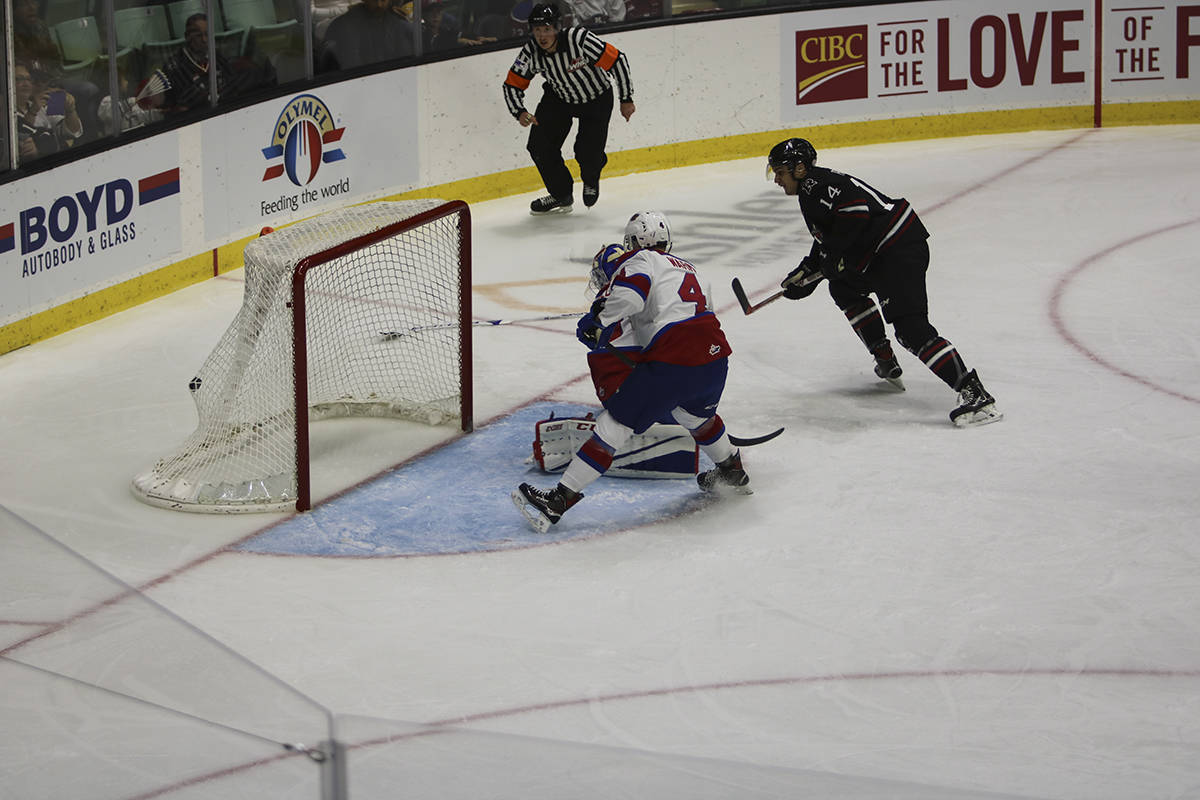 HOME OPENER - Rebels right-wing Austin Pratt nailed this early first period goal to put the home team up 1-0. The Rebels would go on to win the game 7-3.                                Todd Colin Vaughan/Red Deer Express