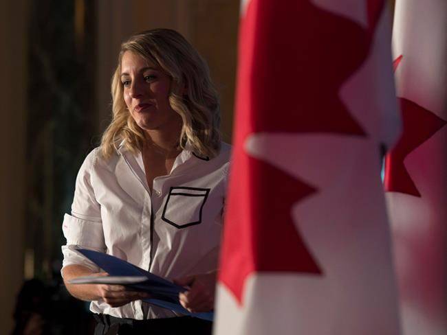 Minister of Canadian Heritage Melanie Joly takes to the stage to outline the government’s vision for cultural and creative industries in a digital world in Ottawa on Thursday. (Adrian Wyld/The Canadian Press)