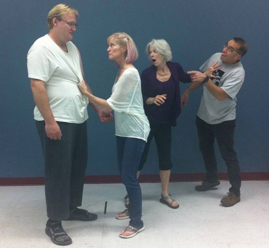 RUN THROUGH - The cast of Central Alberta Theatre’s dinner theatre season opener runs through a scene of Buying the Moose. The production opens Oct. 13th at the Black Knight Inn. photo submitted