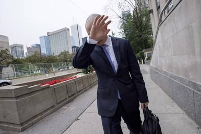 Sears Canada Chief Financial Officer Billy Wong walks away from the Ontario Superior Court in Toronto on July 13, 2017. THE CANADIAN PRESS/Frank Gunn