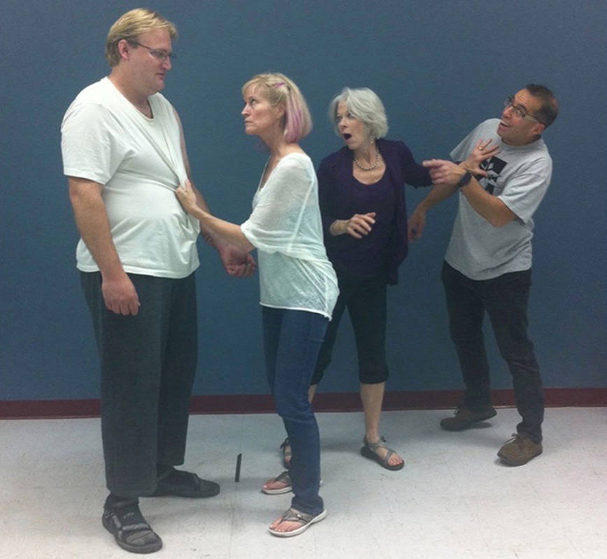 SEASON OPENER - The cast of Central Alberta Theatres dinner theatre season opener runs through a scene of Buying the Moose, which runs through to Nov. 4th at the Black Knight Inn.                                photo submitted