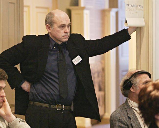 Actor John Dunsworth listens to a speaker at a news conference in Halifax on April 12, 2005. (Canadian Press photo)