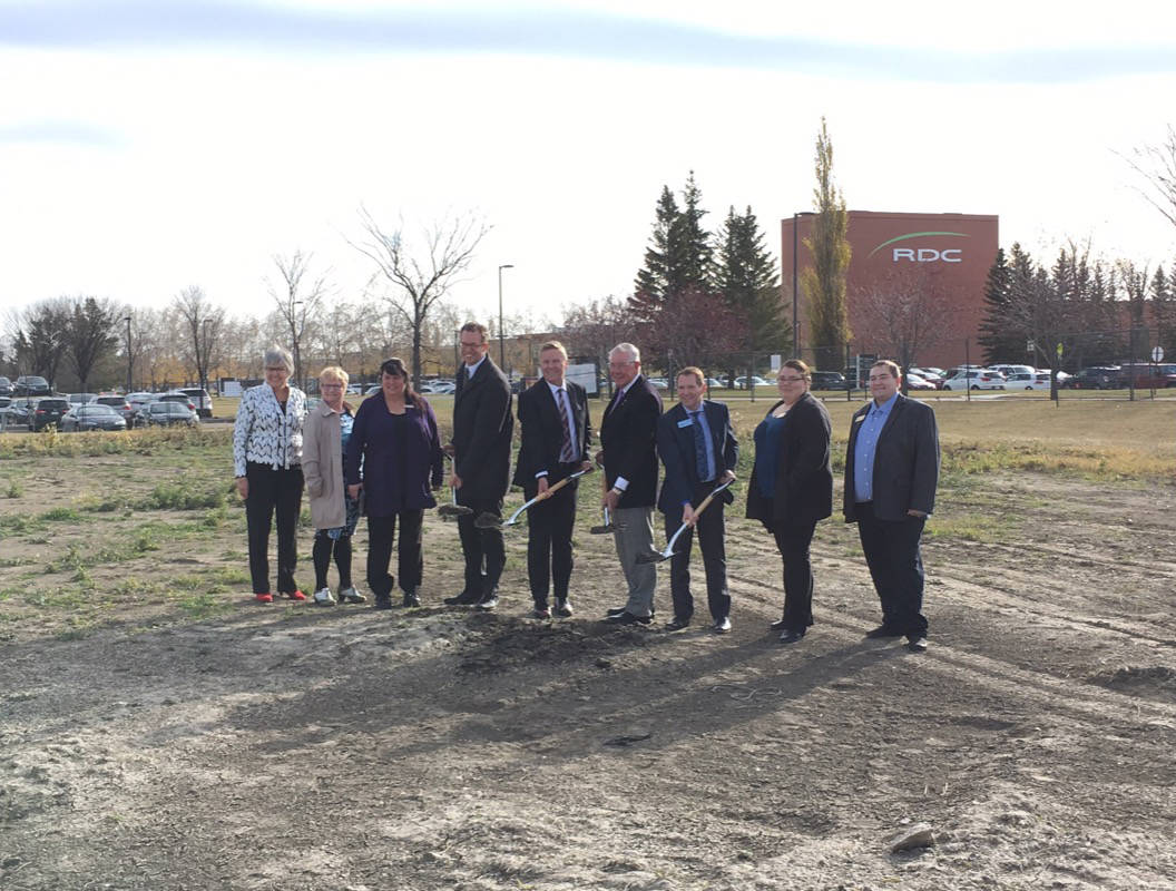 CONSTRUCTION BEGINS - Officials with the provincial government and Red Deer College dig the first holes for the new student residence. Erin Fawcett/Red Deer Express