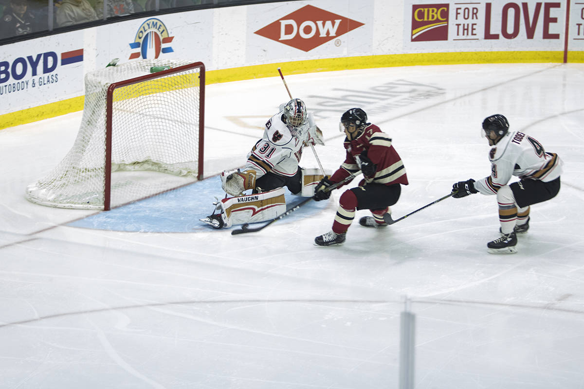 BIG PLAY - Rebels’ forward Reese Johnson would come close on this chance against Calgary Hitmen netminder Nick Schneider. The Rebels would go on to to win 4-2.                                Todd Colin Vaughan/Red Deer Express