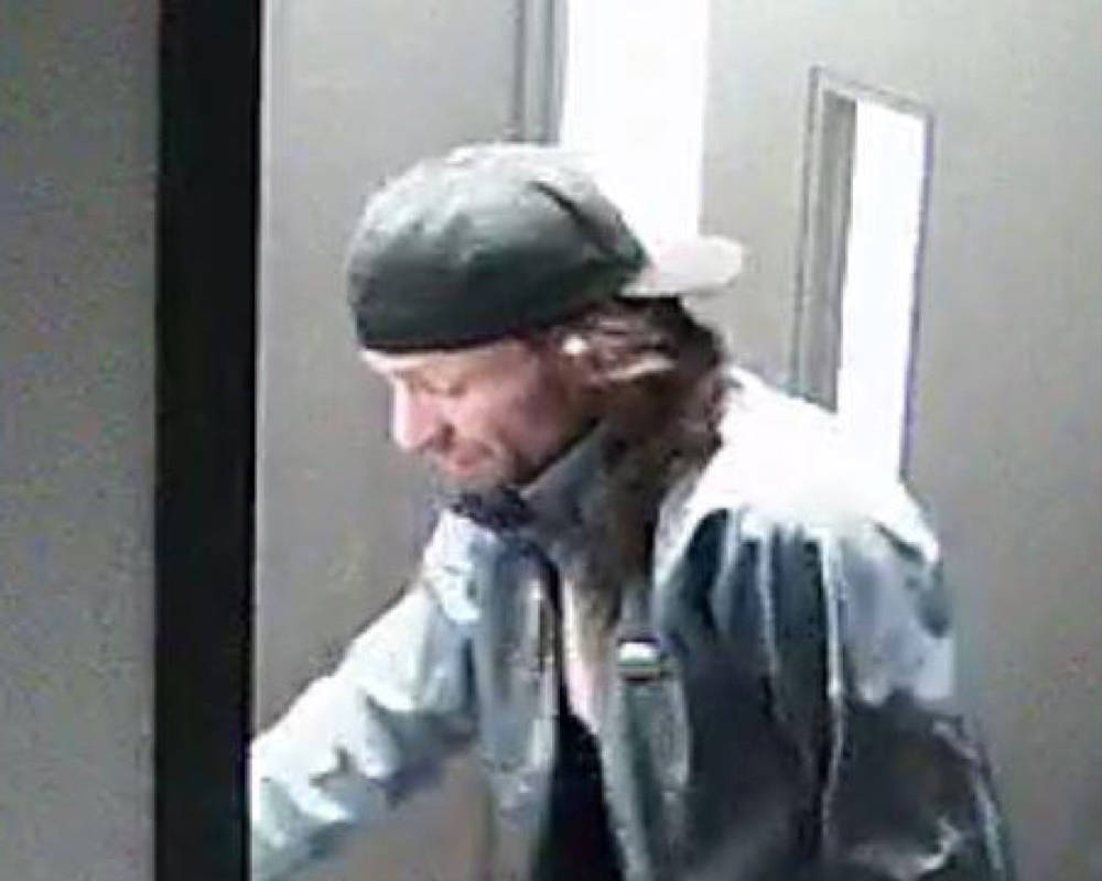 WANTED - Police are searching for this man who is allegedly connected to a theft that took place at the Alberta Energy Regulator office early yesterday morning. photo submitted