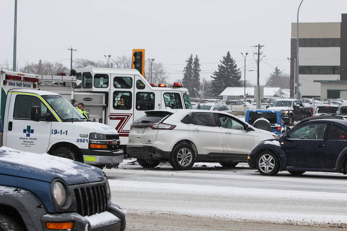 COLLISION - A collision between vehicles at 43rd St. and Taylor Drive has caused delays. Snowfall has left roads in and around the Red Deer area slippery.                                Todd Colin Vaughan/Red Deer Express