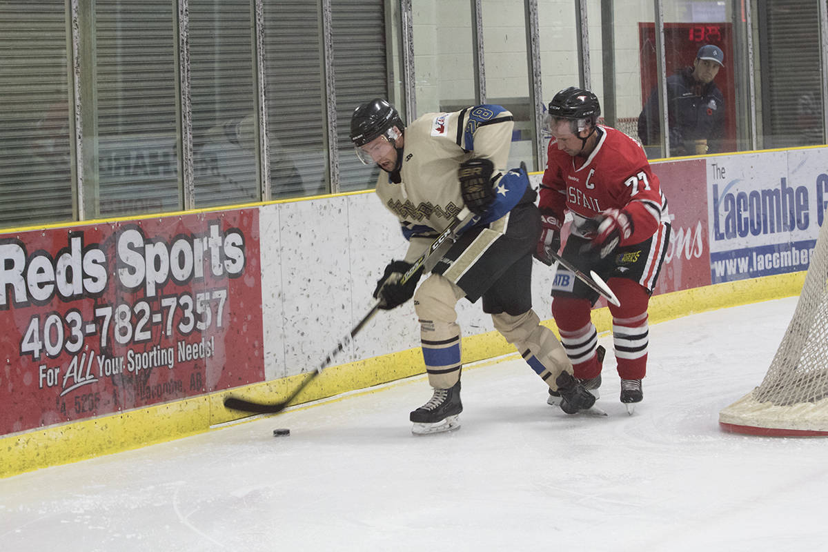 GRUDGE MATCH - The Lacombe Generals and Innisfail Eagles played a rough one at the Gary Moe Autogroup Sportsplex. The Generalswould eventually pull away with the 4-3 shootout win. Todd Colin Vaughan/Red Deer Express