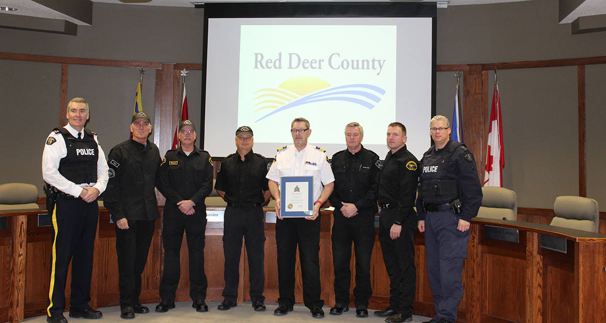 HARD WORK - Red Deer County Protective Services staff and volunteers were recognized by the RCMP for their assistance in the wildfires in the Waterton National Park region. Carlie Connolly/Red Deer Express
