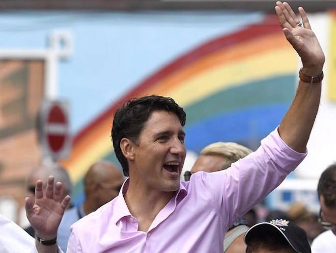 Prime Minister Justin Trudeau marches in the Ottawa Capital Pride parade, Sunday, Aug. 27, 2017. THE CANADIAN PRESS/Justin Tang