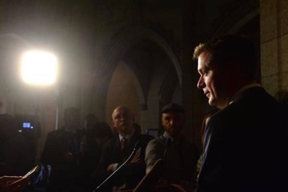 Conservative leader Andrew Scheer speaks with the media in the Foyer of the House of Commons Wednesday. (Adrian Wyld/The Canadian Press)