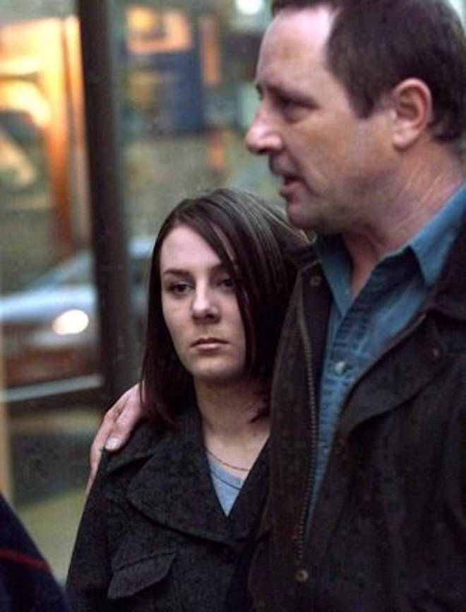 Kelly Ellard and her father Lawrence leave the Vancouver courthouse, March 30, 2000. THE CANADIAN PRESS/ Adrian Wyld