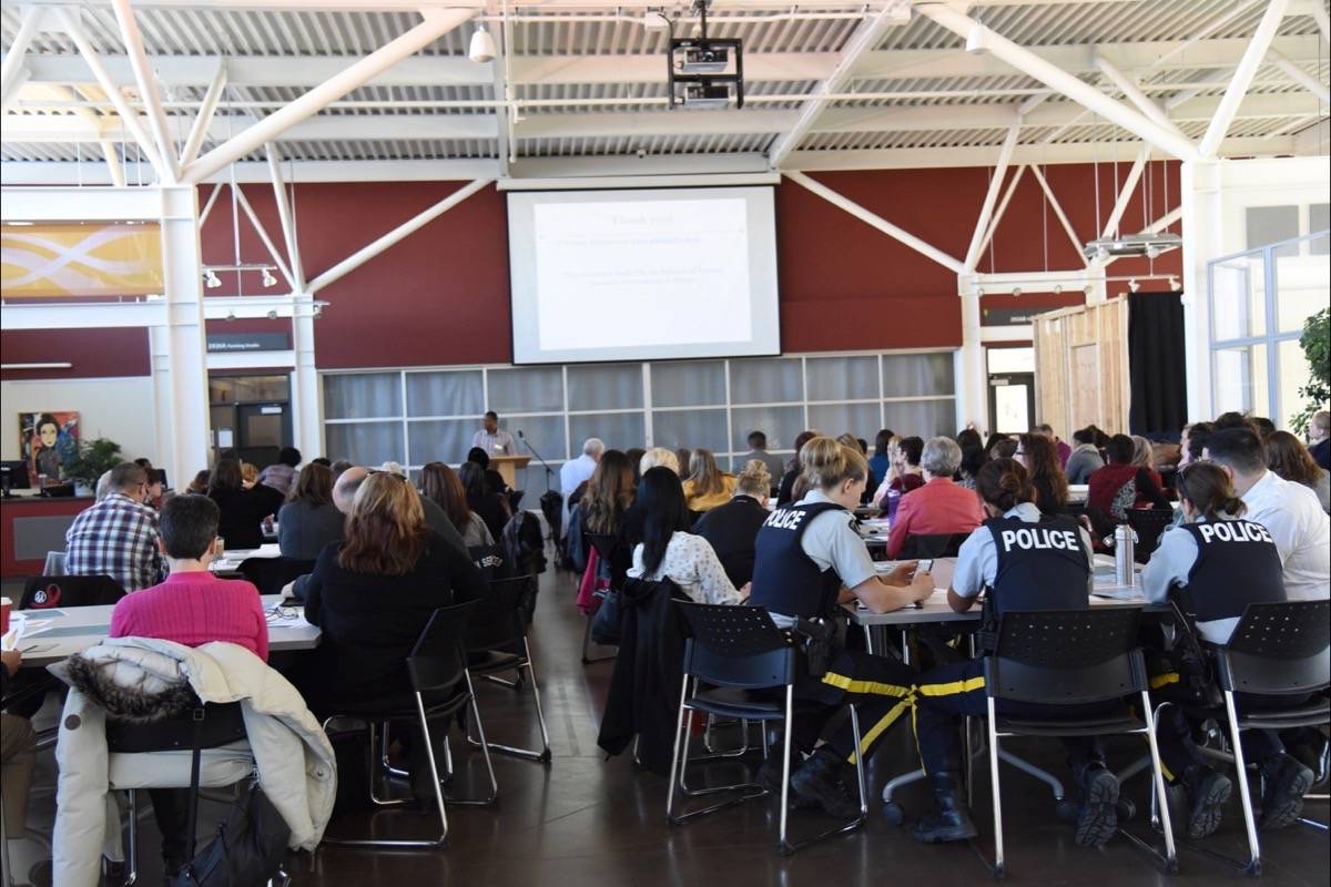 DISCUSSION - Tabitha Phiri, research program coordinator with the Central Alberta Immigrant Women’s Association, speaks at community forum at Red Deer College. Michelle Falk/Red Deer Express