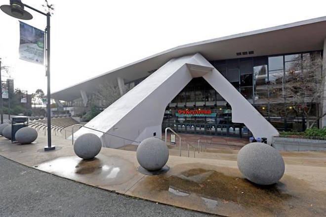 Steps lead down to the east entrance of KeyArena, a sports and entertainment venue at the Seattle Center, Monday, Dec. 4, 2017, in Seattle. (AP Photo/Elaine Thompson)