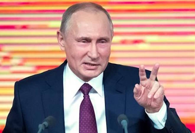 Russian President Vladimir Putin gestures during his annual news conference in Moscow, Russia, Thursday, Dec. 14, 2017. (AP Photo/Pavel Golovkin)