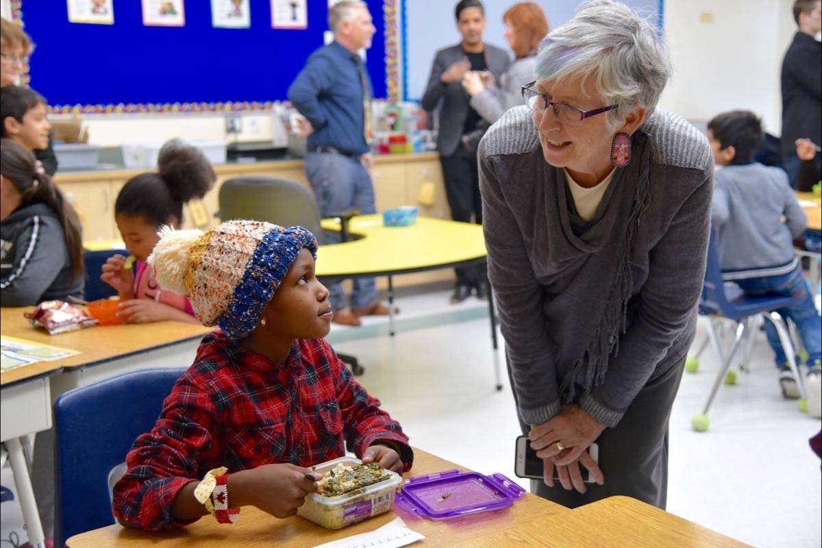 FIRST DAY - Newly appointed Parliamentary Secretary to the Education Minister Annie McKitrick chats with nine-year-old Safa Yahya, a Sudanese refugee, on her first day as a student at Fairview Elementary School. Michelle Falk/Red Deer Express