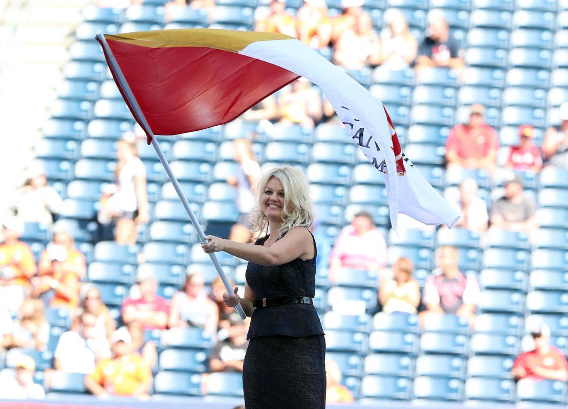 HUGE MOMENT - Mayor Tara Veer waves the Canada Games flag at the closing ceremonies in Winnipeg.                                photo by Scott Grant/Canada Games