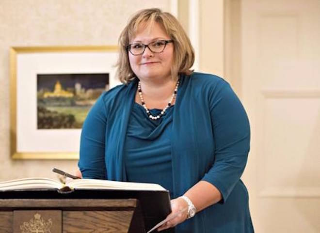 Sarah Hoffman, newly appointed Alberta Deputy Premier is sworn in, in Edmonton Alta, on Monday February 2, 2016. THE CANADIAN PRESS/Jason Franson
