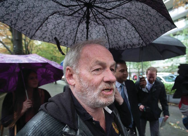 Ivan Henry, who was wrongfully convicted of sexual assault in 1983, leaves B.C. Supreme Court during a lunch break in Vancouver, B.C., on August 31, 2015. THE CANADIAN PRESS/Darryl Dyck