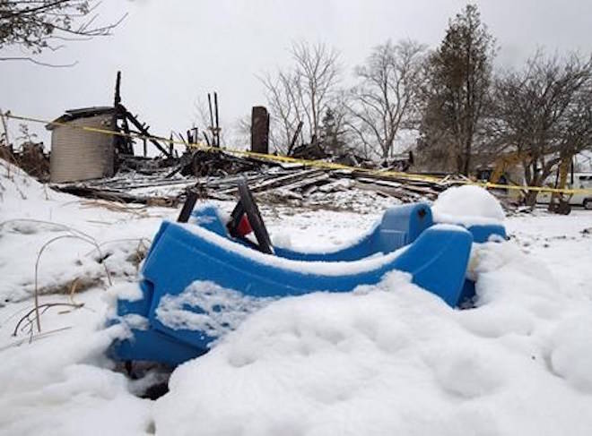 A toy car is seen on the property of a house destroyed in a weekend fire in Pubnico Head, N.S. on Monday, Jan. 8, 2018. THE CANADIAN PRESS/Andrew Vaughan