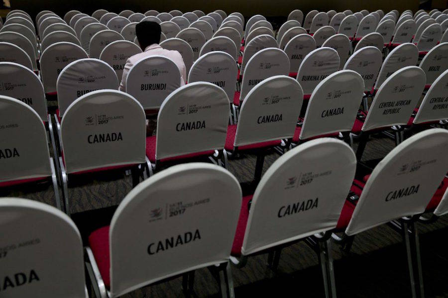 A delegate waits for the start of the closing ceremony at the World Trade Organization Ministerial Conference in Buenos Aires, Argentina, on Dec. 13. The Canadian complaint filed to the World Trade Organization alleges that American use of anti-dumping and countervailing duties violate global trade rules. (NATACHA PISARENKO / THE ASSOCIATED PRESS FILE PHOTO)
