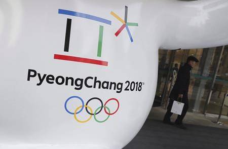 The official emblem of the 2018 Pyeongchang Olympic Winter Games is seen in downtown Seoul, South Korea, on January 4, 2018. (Lee Jin-man/The Canadian Press via AP)
