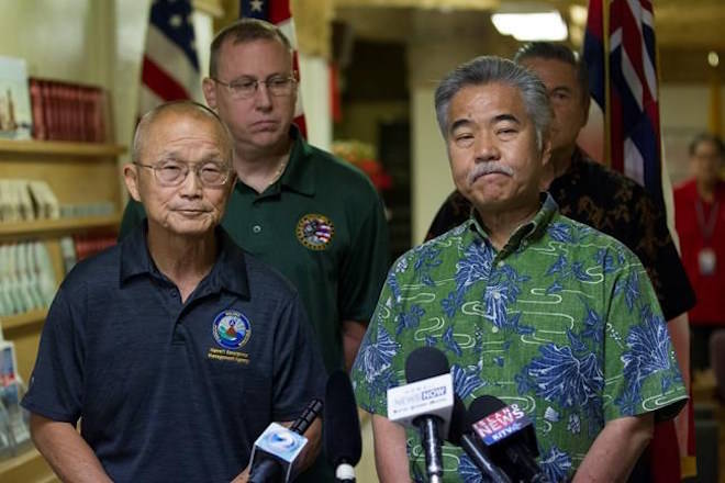 Vern Miyagi, Administrator, HEMA, left, and Hawaii Gov. David Ige addressed the media Saturday, Jan. 13, 2018, during a press conference at the Hawaii Emergency Management Center at Diamond Head Saturday following the false alarm issued of a missile launch on Hawaii. A push alert that warned of an incoming ballistic missile to Hawaii and sent residents into a full-blown panic was a mistake, state emergency officials said. (George F. Lee /The Star-Advertiser via AP)