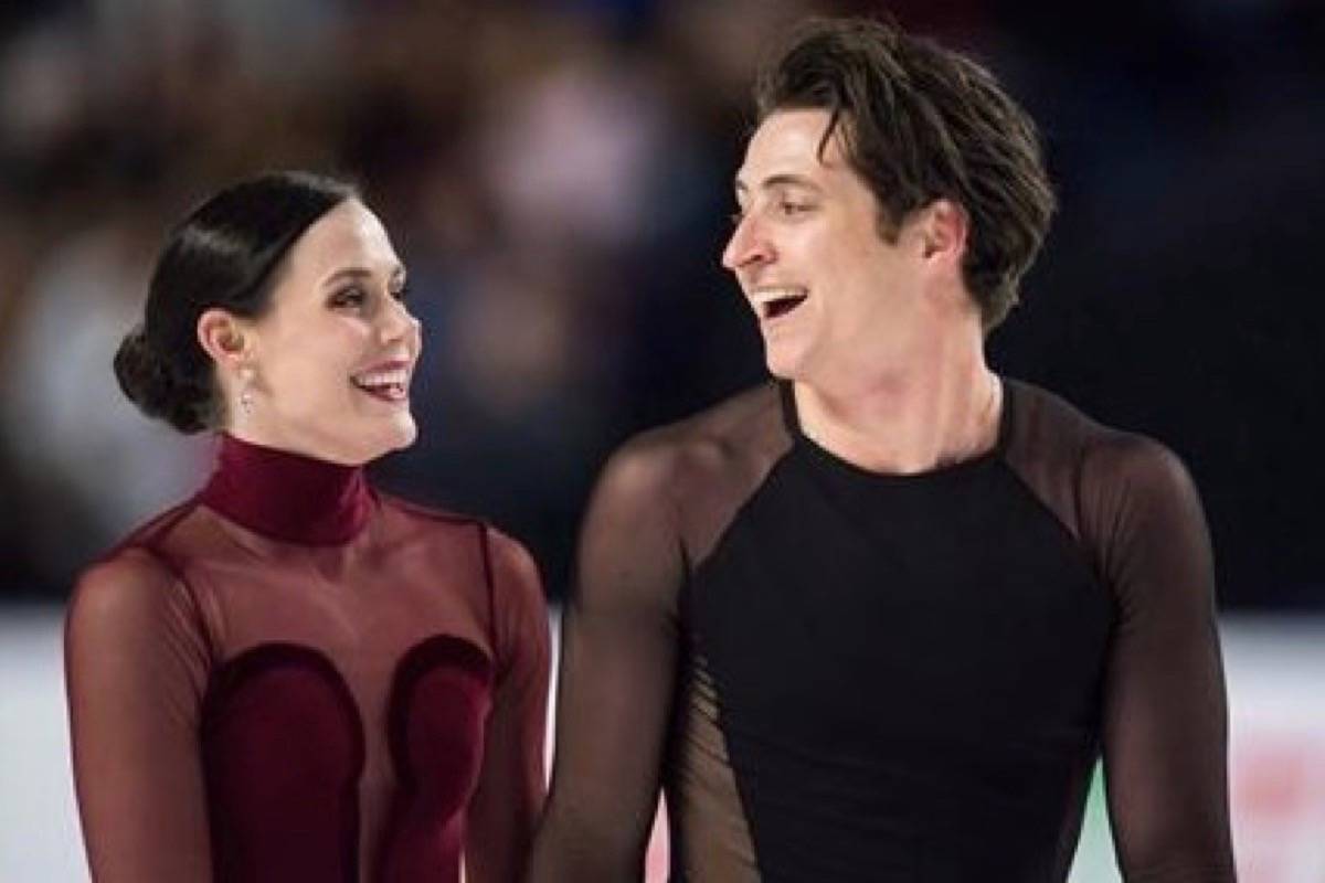 Tessa Virtue and Scott Moir skate off the ice after performing their free dance during the senior ice dance competition at the Canadian Figure Skating Championships in Vancouver last Saturday. (Jonathan Hayward / The Canadian Press)