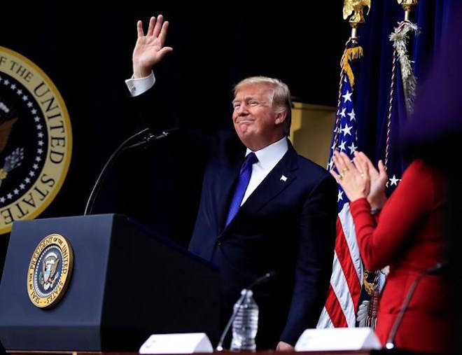 President Donald Trump waves after speaking at the Conversations with the Women of America at the Eisenhower Executive Office Building on the White House complex in Washington, Tuesday, Jan. 16, 2018. (AP Photo/Manuel Balce Ceneta)