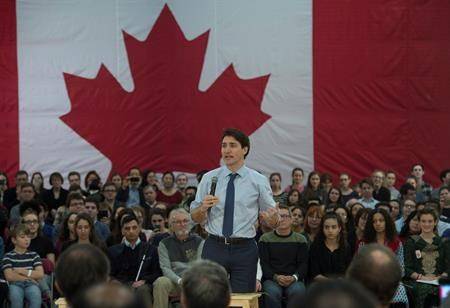 Prime Minister Justin Trudeau speaks during a town hall meeting Thursday in Quebec City. (Jacques Boissinot/The Canadian Press)