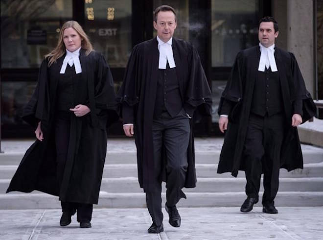 Crown persecutor Doug Taylor, centre, leaves court after Joshua Frank and Jason Klaus were pronounced guilty by a judge in Red Deer, Alta., Wednesday, Jan. 10, 2018. The pair were found guilty of first-degree murder in the shooting deaths of Klaus’s parents and sister in a rural home near Castor, Alberta in December 2013. THE CANADIAN PRESS/Jeff McIntosh