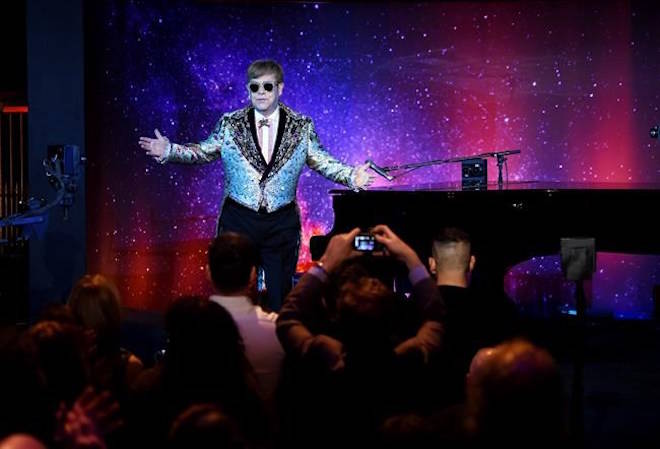 Singer Elton John performs before announcing final world tour at Gotham Hall on Wednesday, Jan. 24, 2018, in New York. (Photo by Evan Agostini/Invision/AP)