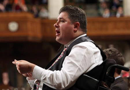 Sport and Disabilities Minister Kent Hehr is shown during Question Period in the House of Commons in Ottawa, Thursday, December 7, 2017. Hehr is out of the federal cabinet _ at least for now _ after being accused of making inappropriate sexual remarks while in provincial politics a decade ago. Fred Chartrand/The Canadian Press