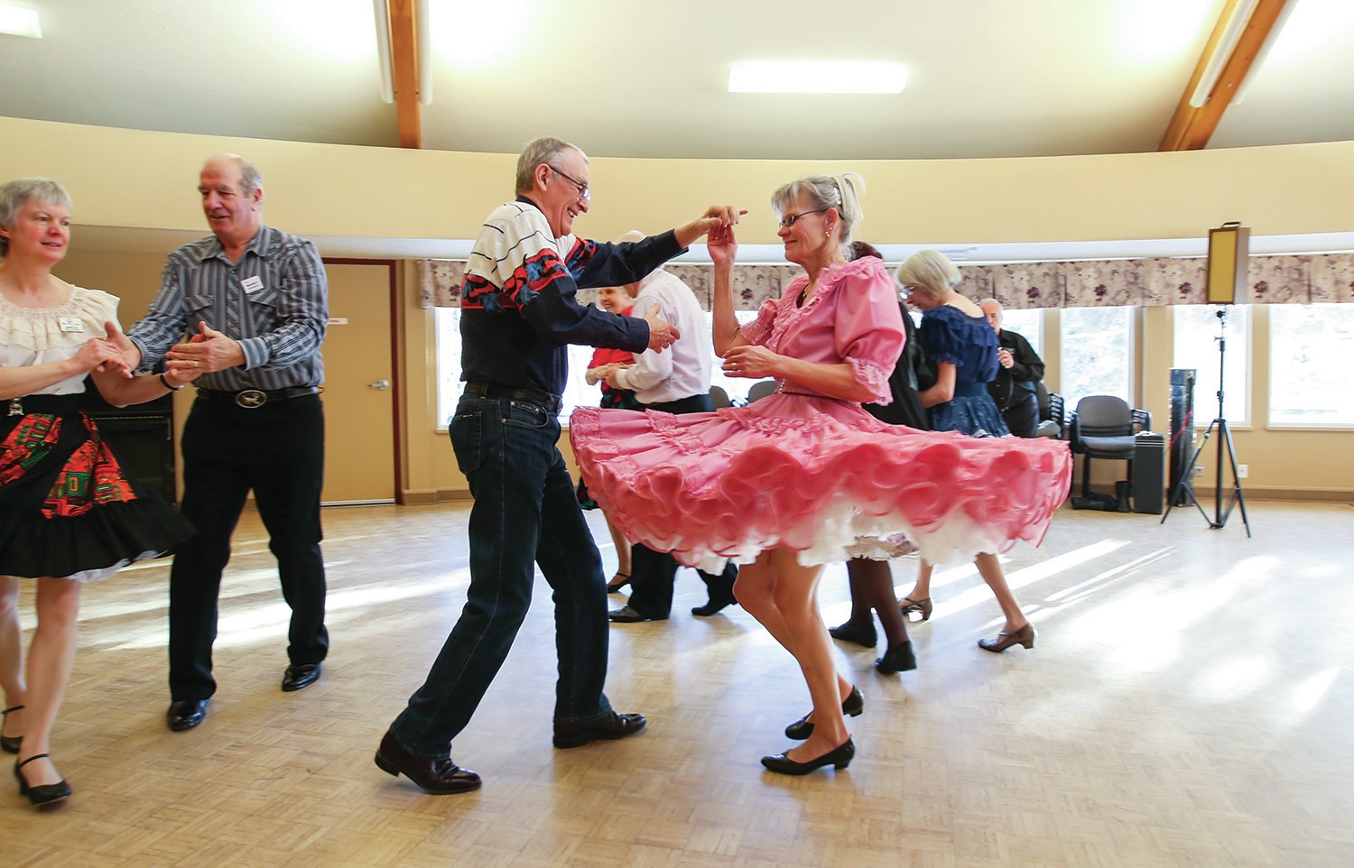 DO-SI-DO- From left, Andre Laliberte spun Ingrid Jansen during a square dance at the Golden Circle Seniors Resource Centre in Red Deer on Friday. Zachary Cormier/Red Deer Express