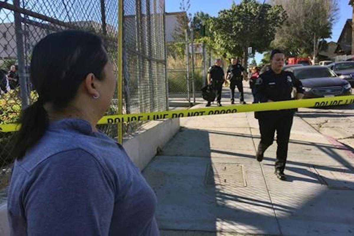 Teen critical after L.A. school shooting, student arrested
