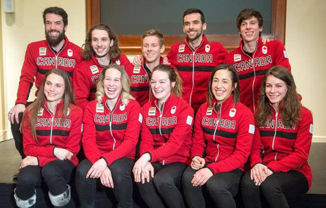 Canada’s short track speedskating team for the 2018 Winter Olympics is introduced Wednesday, January 24, 2018 in Montreal. Front row left to right: Kasandra Bradette, Marianne St-Gelais, Kim Boutin, Valerie Maltais, Jamie Macdonald. Back row left to right: Charles Hamelin, Samuel Girard, Pascal Dion, Francois Hamelin, Charle Cournoyer. (Ryan Remiorz/The Canadian Press)